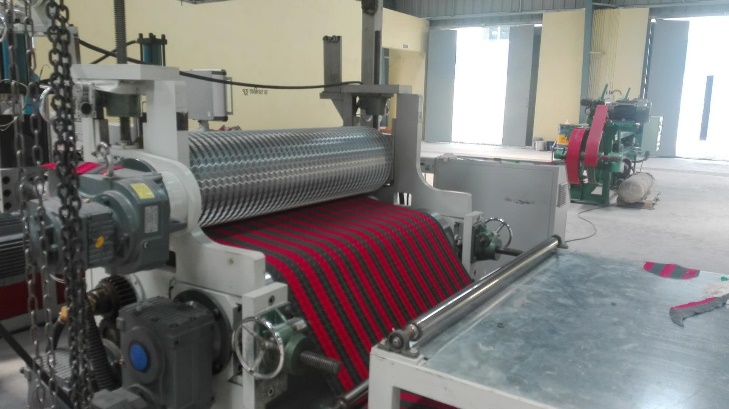 Máy sản xuất tấm trải sàn ô tô